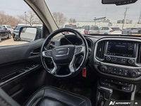 This 2021 GMC Canyon Elevation 4WD Crew Cab is powered by a capable 3.6L V6 engine paired with a smo... (image 9)