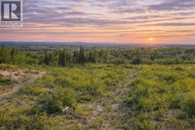 Rare opportunity to own 8.94 acres within Vanderhoof town limits! This exceptional property offers b...