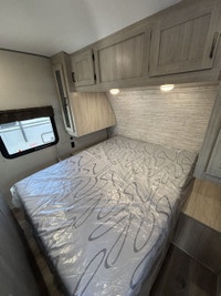 The popular 243RBS is the ideal couple’s coach! This floorplan boasts a full-size super slide with b... (image 6)