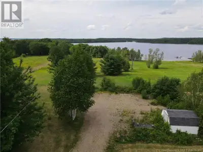 Get ready to soak up the sun this summer at a stunning waterfront property on Youngs Cove. This 3.6-...