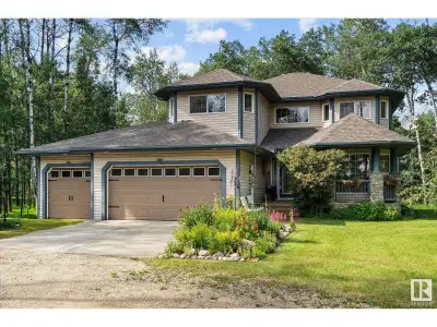Welcome to your dream acreage in Century Estates! This stunning custom-built 2-storey home boasts 2,...