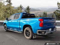 Command the road and conquer any task with this robust Blue 2024 Chevrolet Silverado 1500 LTZ. Equip... (image 2)