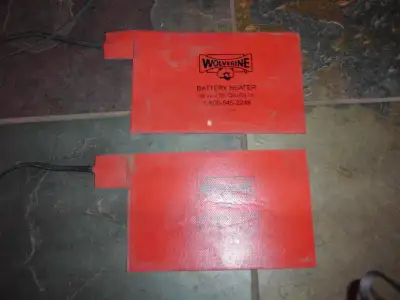 2 Wolverine Battery Warmers, like new condition. $100.00 each or both for $180.00. Call 403 831 4100