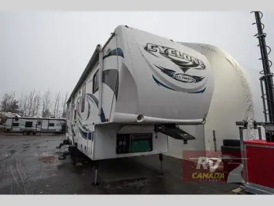 Please Call Us At 613.851.7326 with any questions? Cyclone FW Toy Hauler by Heartland w/Ramp Door to...