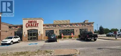 Swiss Chalet building...High exposer busy plaza, next to Costco and Silver City plaza. Swiss Chalet...