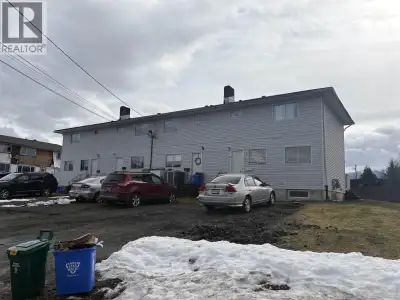 INVESTORS Centrally located 4-plex townhouse opportunity with strong rental appeal. Featuring two sp...