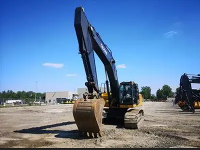 Hours: 5635 | Location: Laval, QC, CA | Arms: Long Arm; Attachments: Coupler; Booms: Standard Boom;...