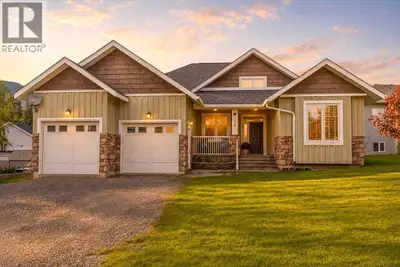 Set on a beautifully landscaped lot in Sparwood's sought-after Valley View neighbourhood, this expan...