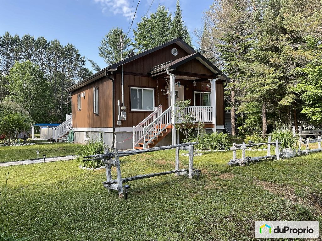 $316,000 - Bungalow for sale in Lac-des-Plages — photo 1