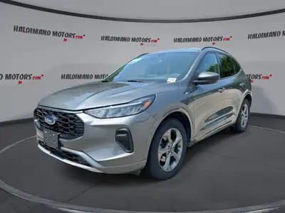 // ACCIDENT FREE!! // This 2023 Ford Escape ST-Line AWD | No Accidents is a smart hybrid SUV built f...