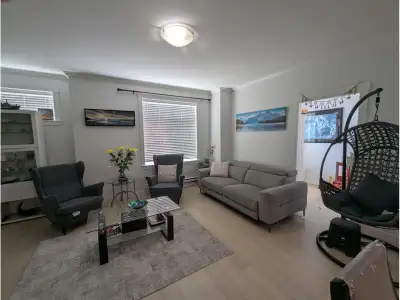 Welcome to this bright and spacious corner-unit home in a highly sought-after central location! Feat...