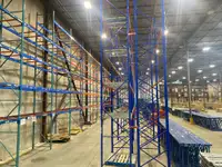 Used 24' tall x 42" deep pallet racking frames - Used 8' beams