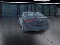 The 2024 Honda Civic Sedan LX-B CVT in sophisticated gray combines front-wheel drive with precise ha... (image 6)