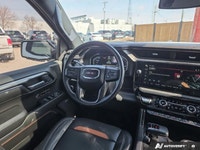 Experience the rugged capability and refined performance of the 2024 GMC Canyon AT4. This used crew... (image 9)