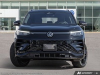 This Volkswagen Tiguan has a trusty Intercooled Turbo Regular Unleaded I-4 2.0 L/121 engine powering... (image 3)
