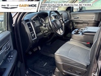 The 2022 Ram 1500 Classic SLT 4x4 Crew Cab stands out with its sophisticated gray exterior and power... (image 5)