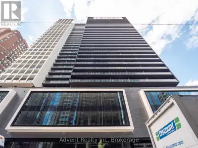 elcome to Unit 2027 at 20 Edward Street, a modern 1-bedroom condo with a dedicated study area in the...