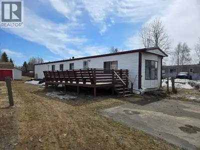 Renovated 3 bedroom mobile in Westside Village park has much to offer for a great price! Hardwood fl...