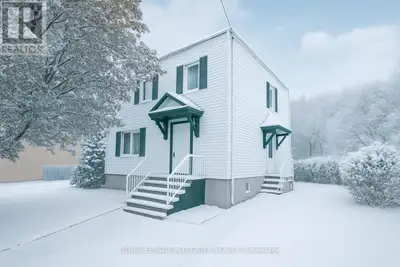 Cashflow and development potential in one clean package! 256 Alfred's double wide lot on R4UA zoning...