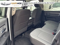 Presenting the stunning 2023 Ram 1500 Classic SLT 4x4 Crew Cab in an elegant White finish, paired wi... (image 6)