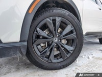 The 2024 Honda CR-V Hybrid Touring is a pre-owned compact SUV that emphasizes refined comfort, effic... (image 6)