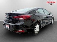 A practical compact sedan with efficient performance, modern convenience features, and a comfortable... (image 3)
