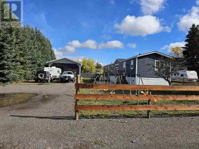 In town convenience with an out of town feel! Newer 2021 manufactured home on a large fenced lot. Th...
