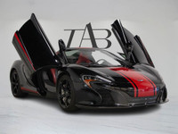 This clean Carfax, Ontario 2015 McLaren 650S Spider is a thrilling low-kilometre supercar finished i... (image 1)