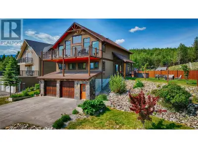 Where quality craftsmanship meets breathtaking views. This stunning 5-bedroom, 3-bathroom home sits...