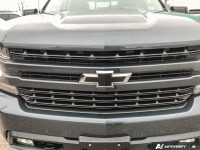 Experience rugged power and refined comfort with this 2021 Chevrolet Silverado 1500 RST. This lightl... (image 9)