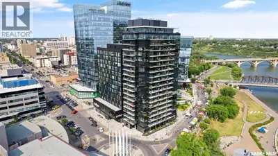 Experience upscale downtown living with breathtaking river and city views from this beautifully upgr...