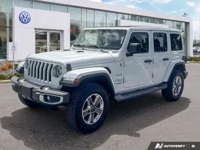 Unleash the spirit of adventure with the 2020 Jeep Wrangler Unlimited Sahara in striking Bright Whit...