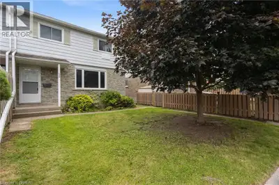 Welcome to Unit 12B at 18 Oakhill Drive in Brantford — a move-in ready two storey condo townhouse of...