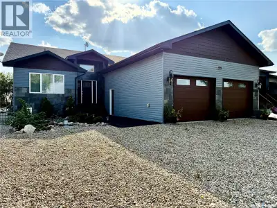 Lakefront Executive Style home at Humboldt Lake! Welcome to this stunning lakefront executive bungal...
