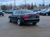 This pre-owned 2008 Audi A4 2.0T offers a timeless design with a sleek black exterior paired with a... (image 3)