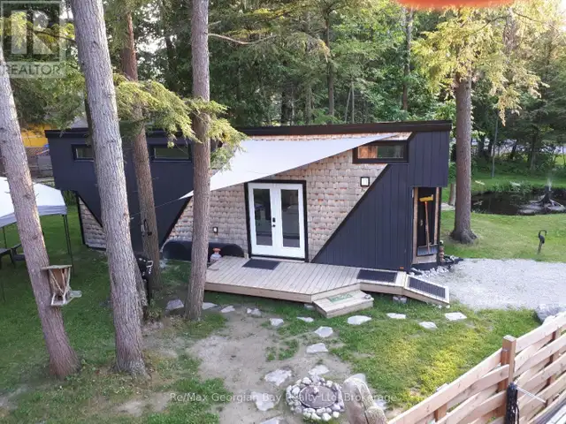 91.5 KING ROAD Tay (Waubaushene), Ontario in Houses for Sale in Barrie - Image 2