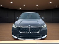 Experience the luxury of driving a black 2023 BMW X1 xDrive28i Sports Activity Vehicle with its comp... (image 2)