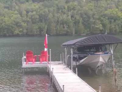 NOT A BOAT LIFT 1 year old canvas in brand new condition 28 foot coverage , includes everything you...