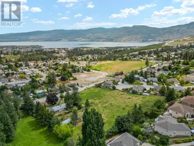 Family estate property with gorgeous lake and mountain views. 3.47 acres! Located in the heart of th...