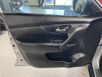 Meet the 2015 Nissan Rogue SL, a silver AWD SUV that perfectly combines robust handling with everyda... (image 9)