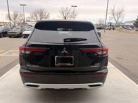 The 2023 Mitsubishi Outlander PHEV LE is a plug-in hybrid SUV that combines fuel efficiency, electri... (image 6)