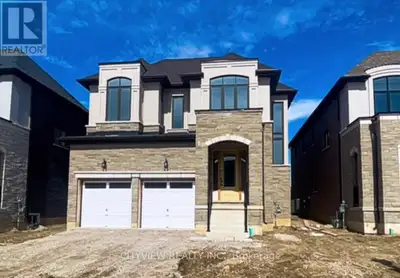 Backing onto a serene green space, this stunning home in Woodstocks sought-after Havelock Corners fe...