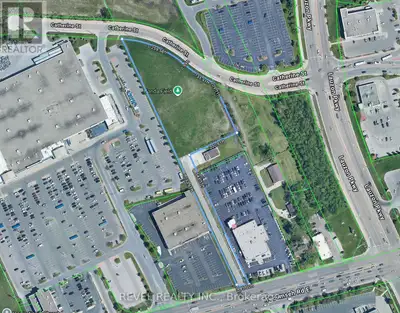 Exceptional 2.71-acre commercial parcel offering a rare build-to-suit plaza opportunity in a high-tr...