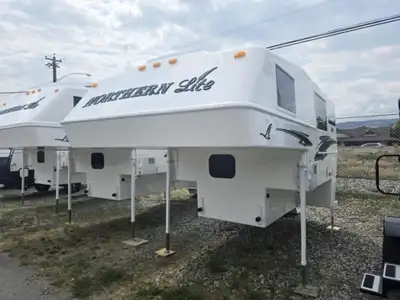 Northern Lite Limited Edition 8-11EXLEWB truck camper highlights: Queen Bed Wet Bath USB Charging St...
