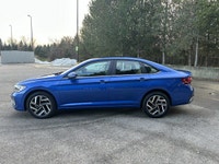 This Volkswagen Jetta has a powerful Turbo Gas 4cyl 1.5L engine powering this Automatic transmission... (image 9)