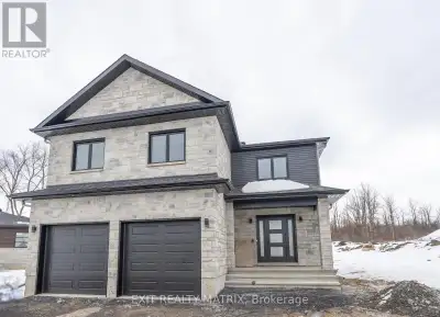 ***HOUSE TO BE BUILT*** Gorgeous and unique 2-storey home designed for the modern family. The open c...