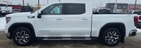 Welcome to Capital GMC! Looking for more luxury in the All New GMC Sierra? This 4WD White Sierra SLT... (image 1)