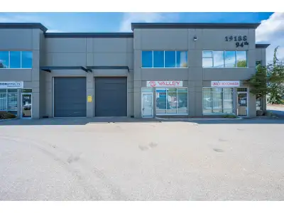 This 2,556 Sq. Ft. concrete tilt-up industrial strata unit, built in 2005, features a 12' W x 10' H...