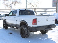 This 2014 Ram 3500 Longhorn is a local trade-in with two keys and lom km's, under the hood sits the... (image 7)