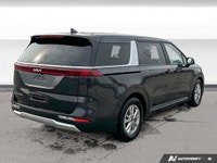 This *2023 Kia Carnival LX* blends minivan practicality with SUV-inspired styling. Powered by a smoo... (image 4)